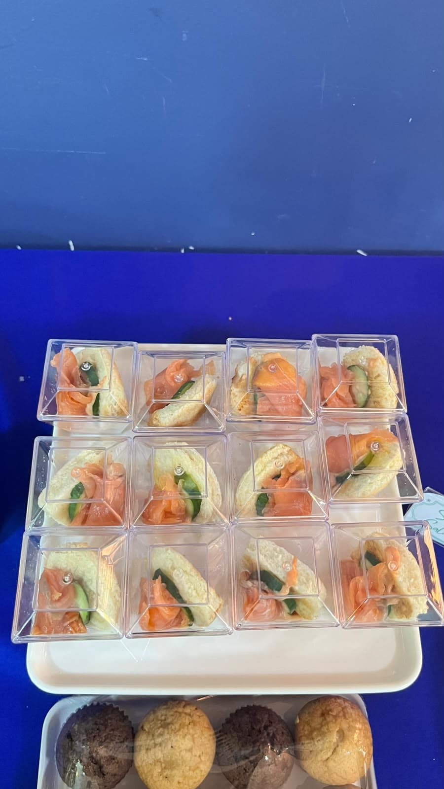 Individually boxed smoked salmon and cucumber sandwiches