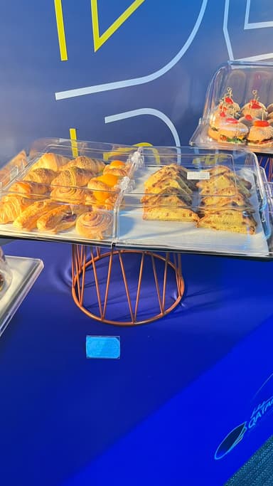Tray of freshly baked croissants for office catering