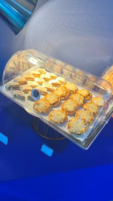 Cheese and vegetable puffs on a copper buffet stand