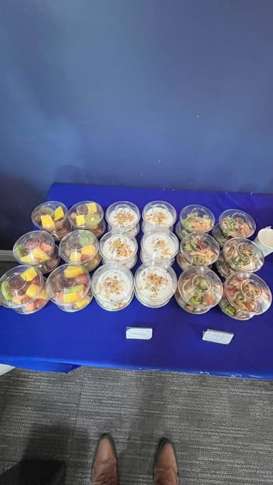 Fruit cups, yoghurt parfaits and salad cups ready to grab